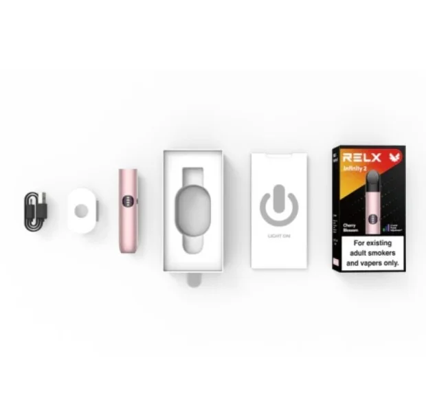 RELX 六代 Infinity 2 Plus 官方原廠盒裝拆解展示：包含主機、充電線與說明書的完整配件清單